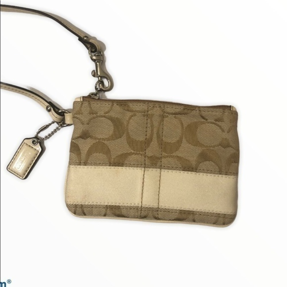 Coach brown creamy white signature stripe wristlet